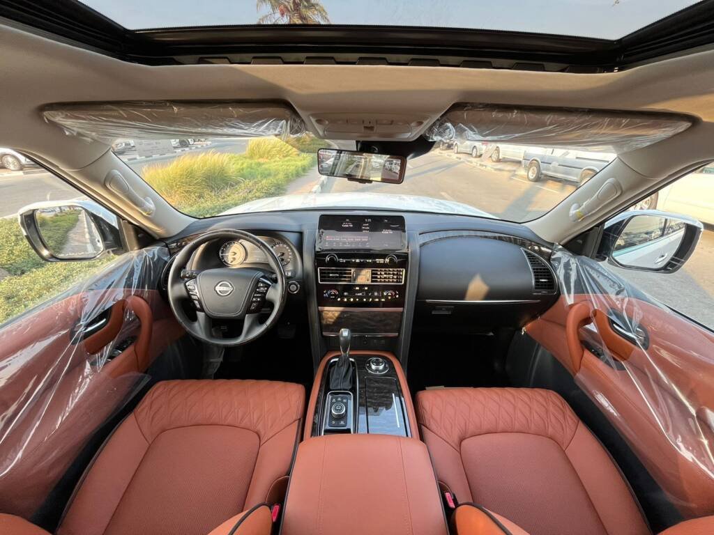 NISSAN PATROL V8 PLATINUM WHITE INSIDE ORANGE 2024