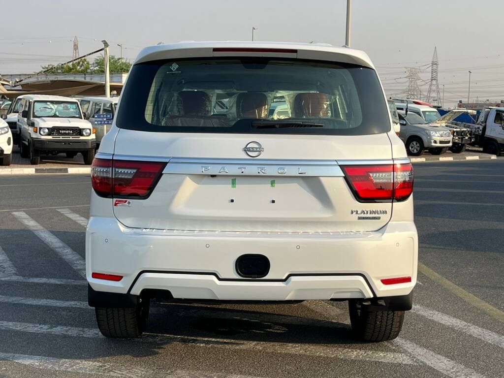 NISSAN PATROL V8 PLATINUM WHITE INSIDE ORANGE 2024
