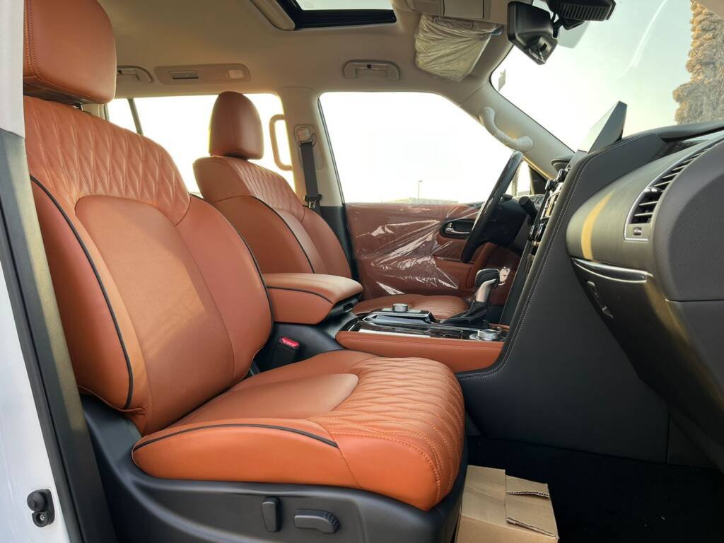 NISSAN PATROL V8 PLATINUM WHITE INSIDE ORANGE 2024