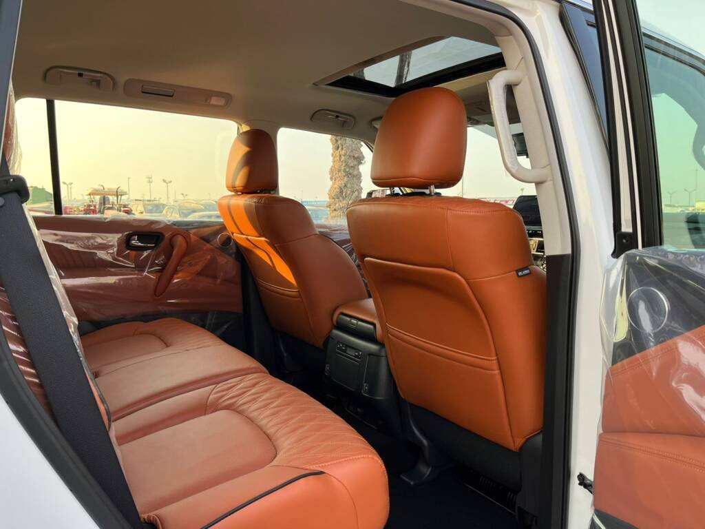 NISSAN PATROL V8 PLATINUM WHITE INSIDE ORANGE 2024